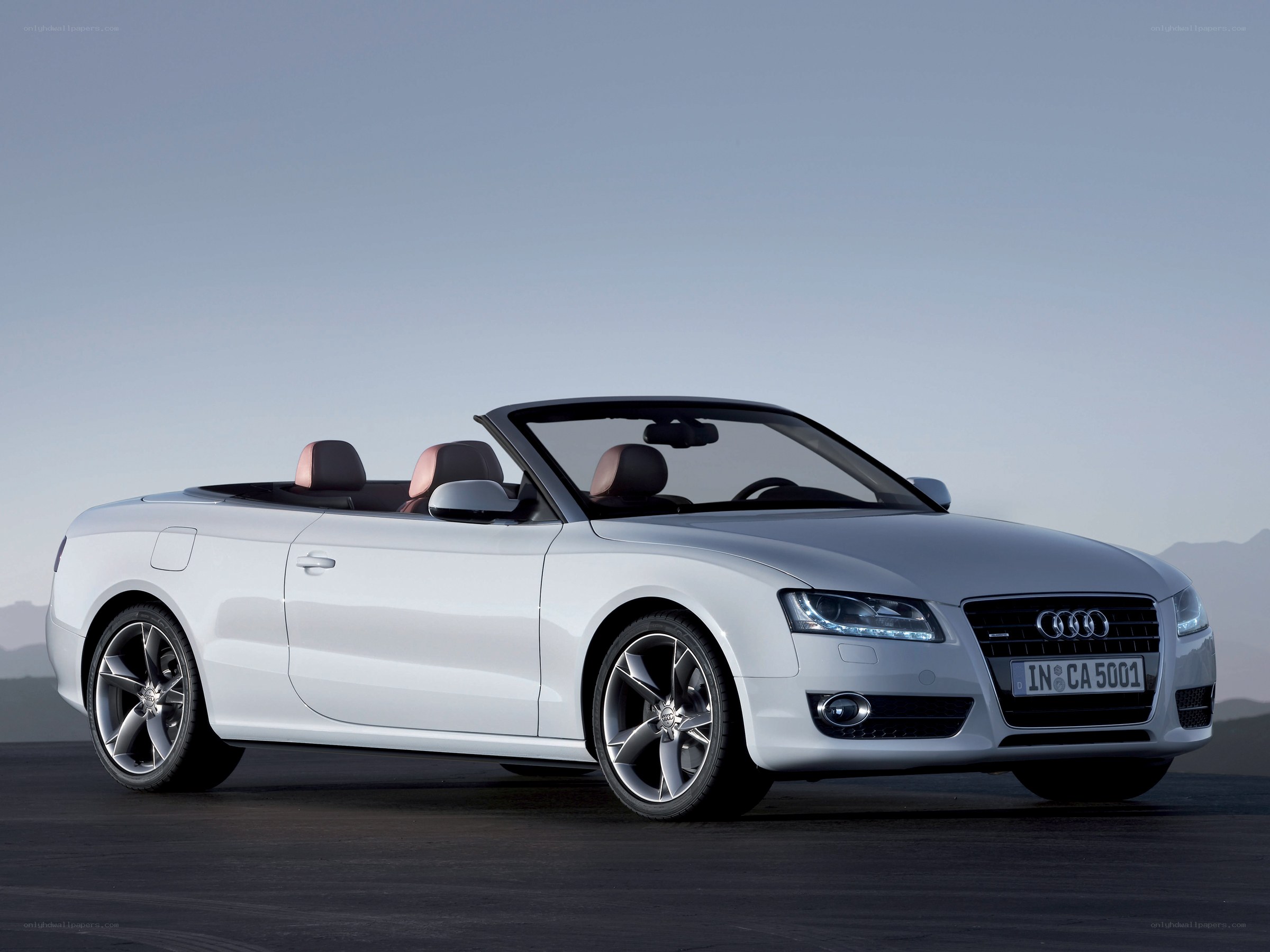 white audi convertible car