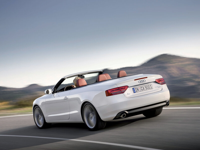 white audi convertible driving