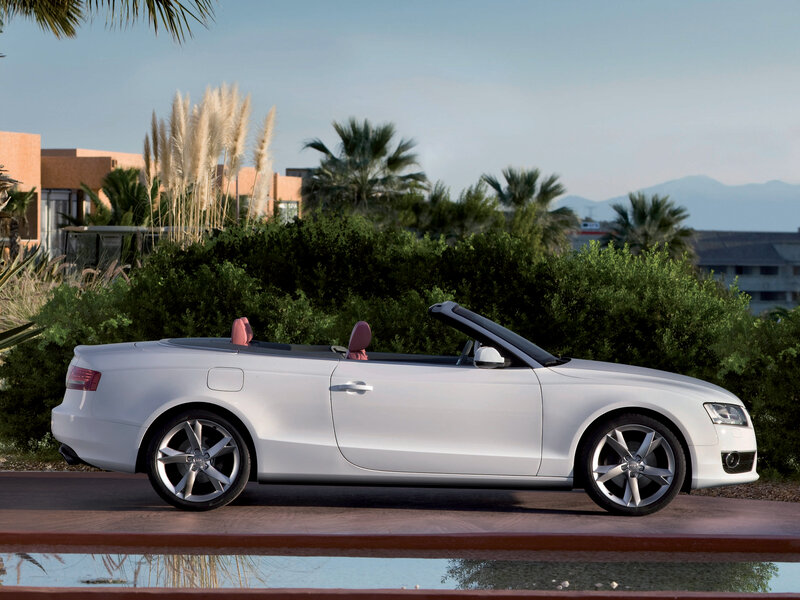 White Audi convertible on a sunny day