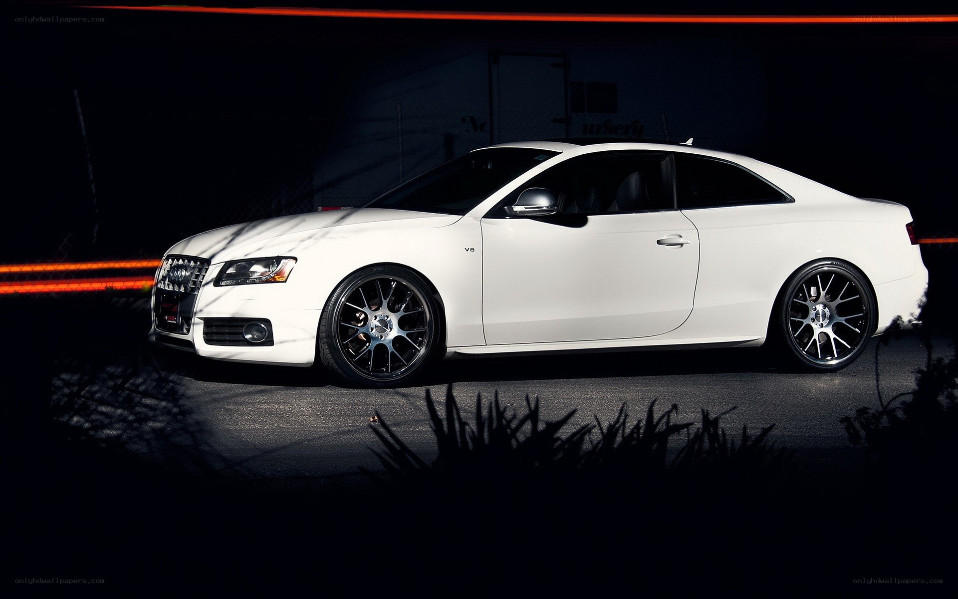 white audi coupe at night