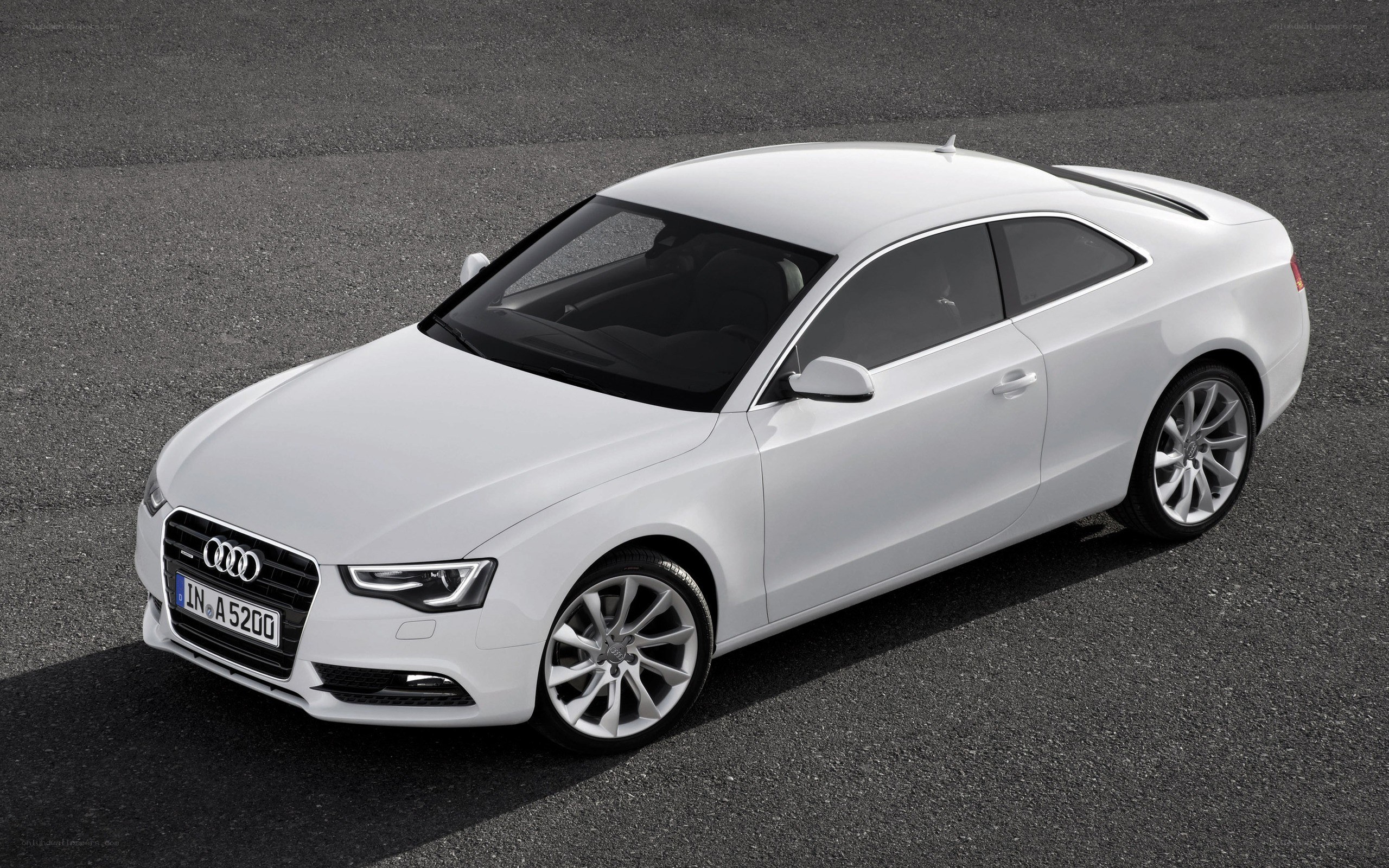 white audi coupe car