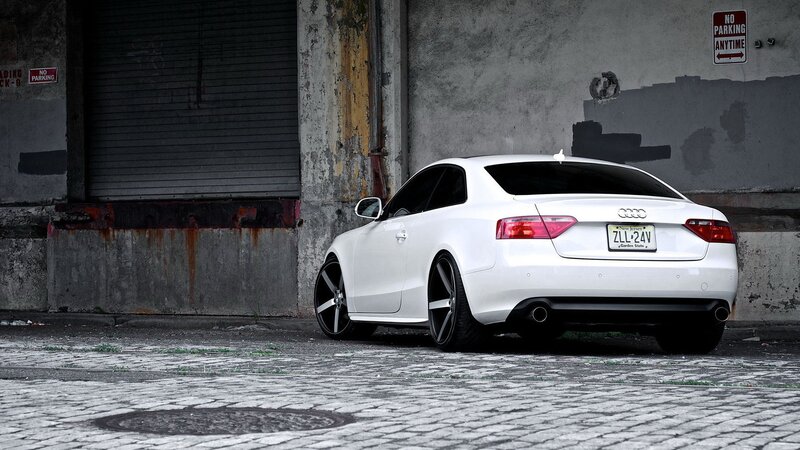 white audi coupe in alley