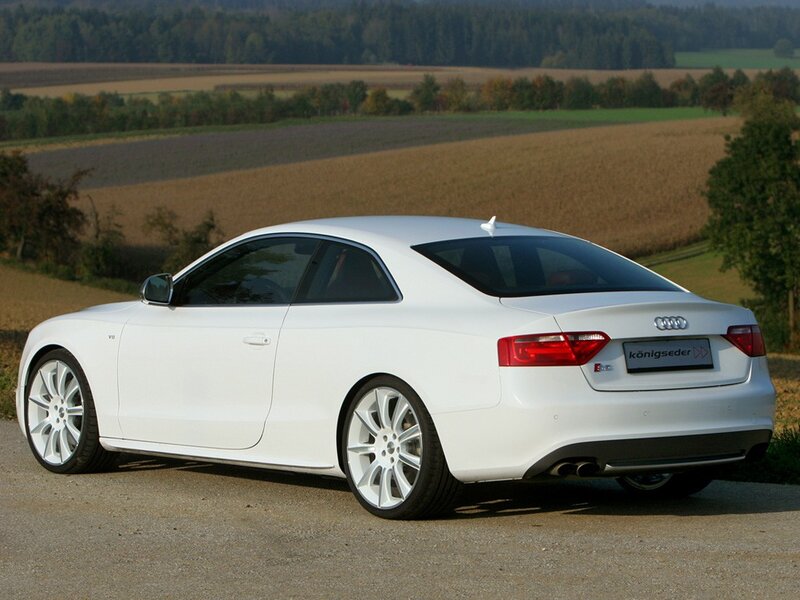 white audi coupe on country road
