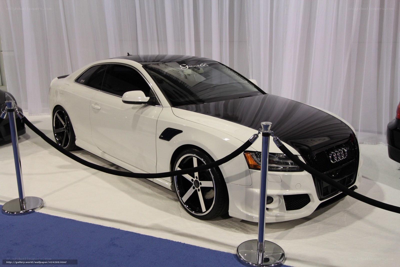 White Audi Coupe on Display