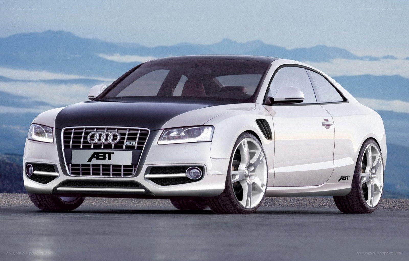 white audi coupe with ABT tuning