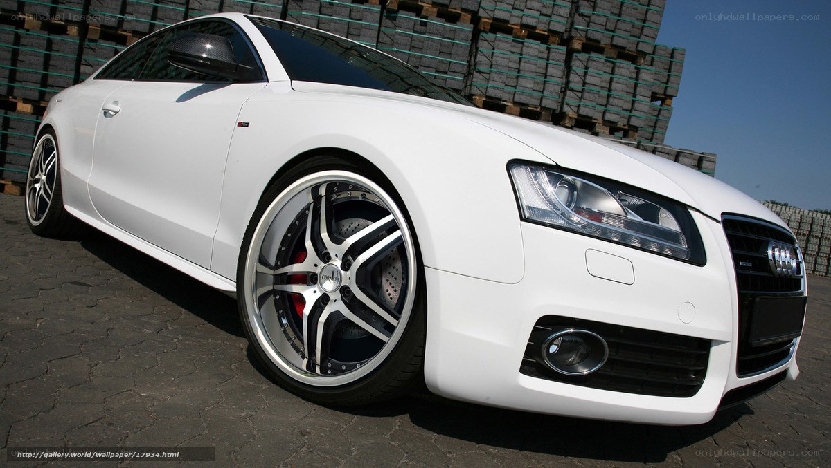 white audi coupe with custom wheels