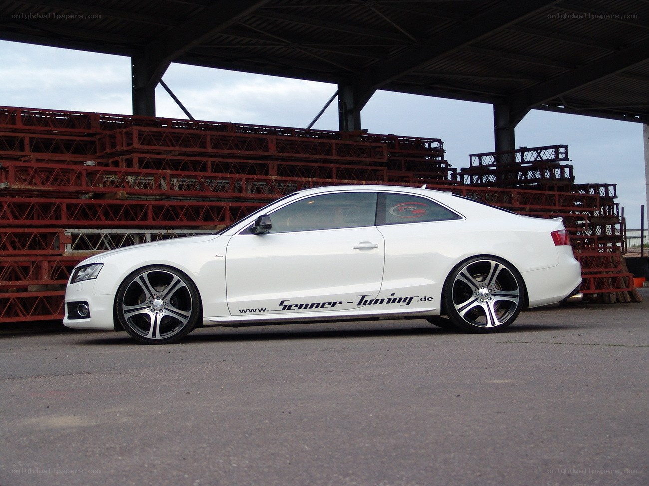 White Audi coupe with tuning decals