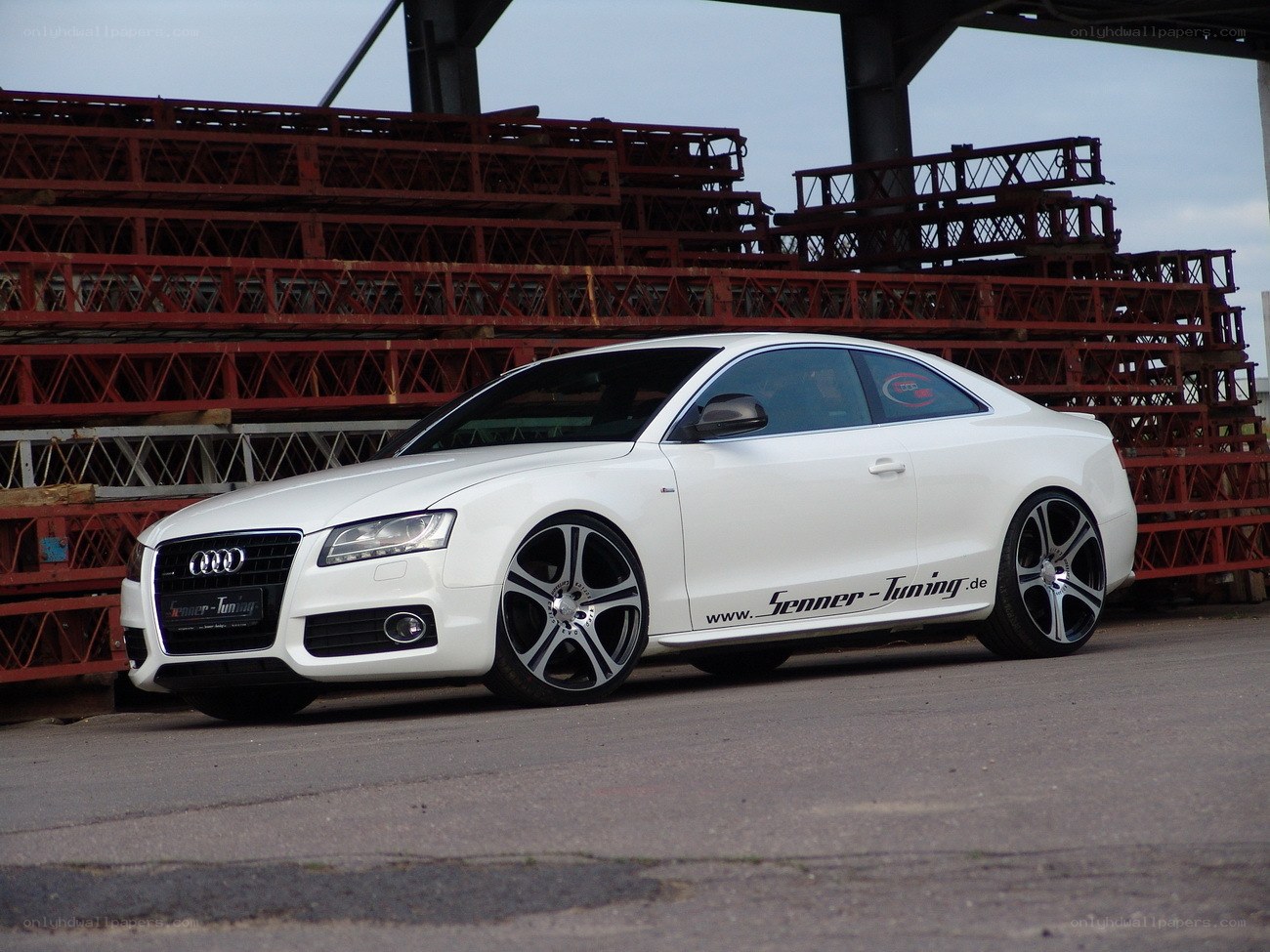 white audi coupe with tuning decals