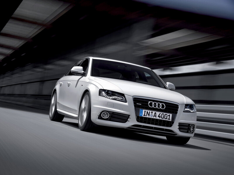 White Audi driving in tunnel