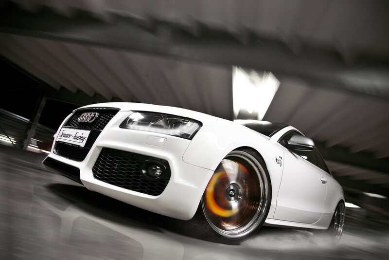 white audi in motion