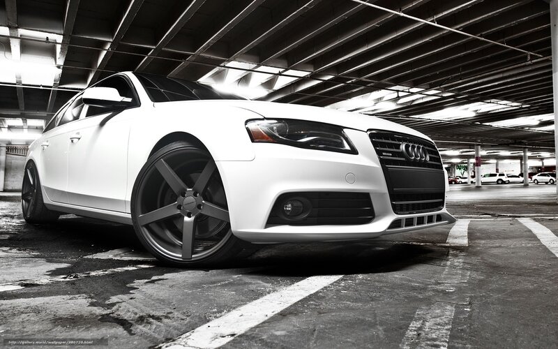 white audi in parking garage