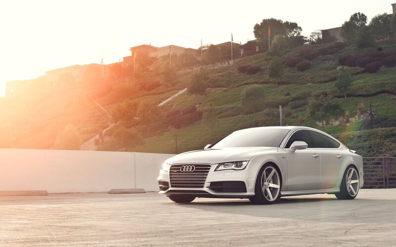White Audi on a hillside