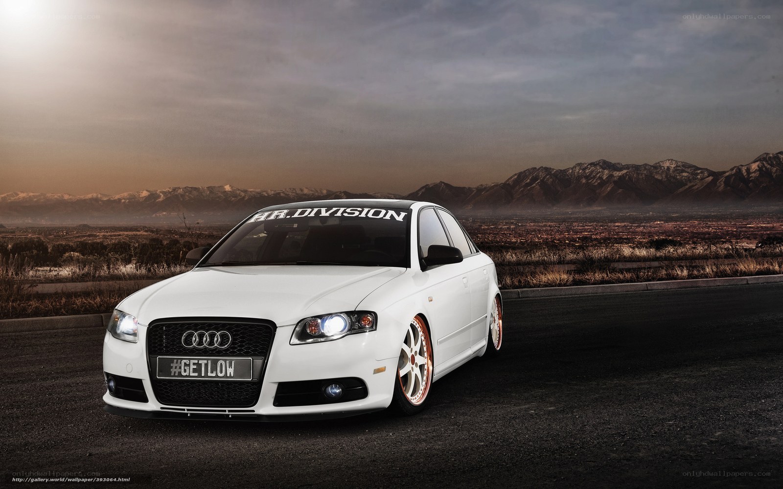 White Audi on a mountain road