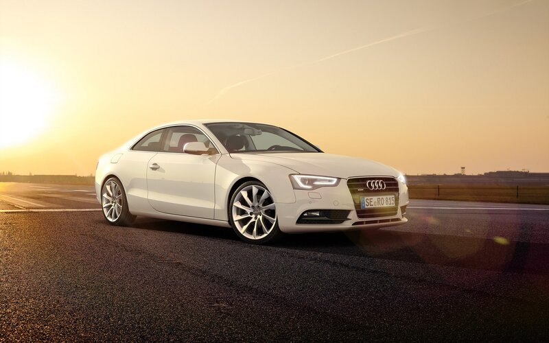 White Audi on a racetrack