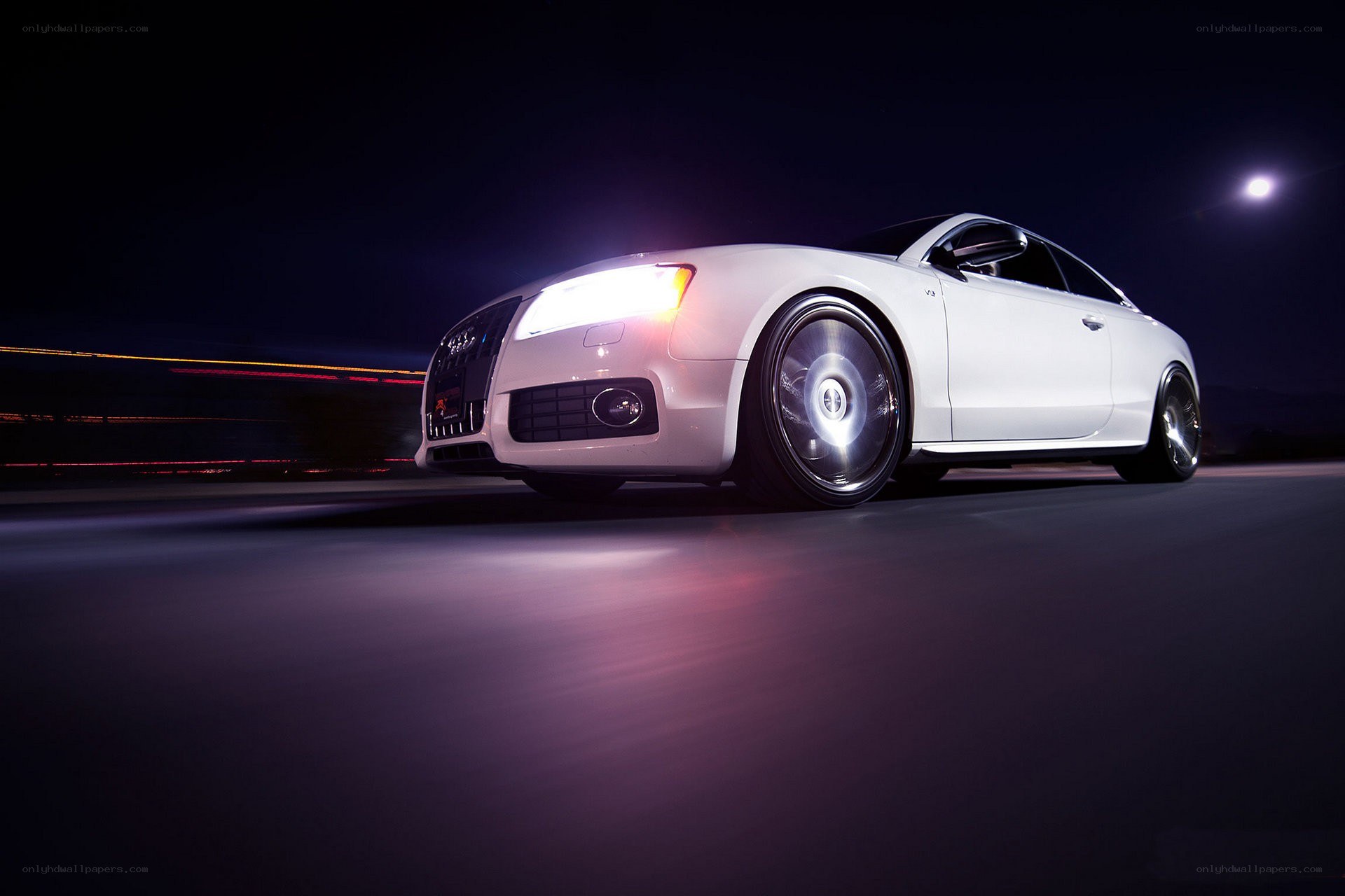 white audi on dark road