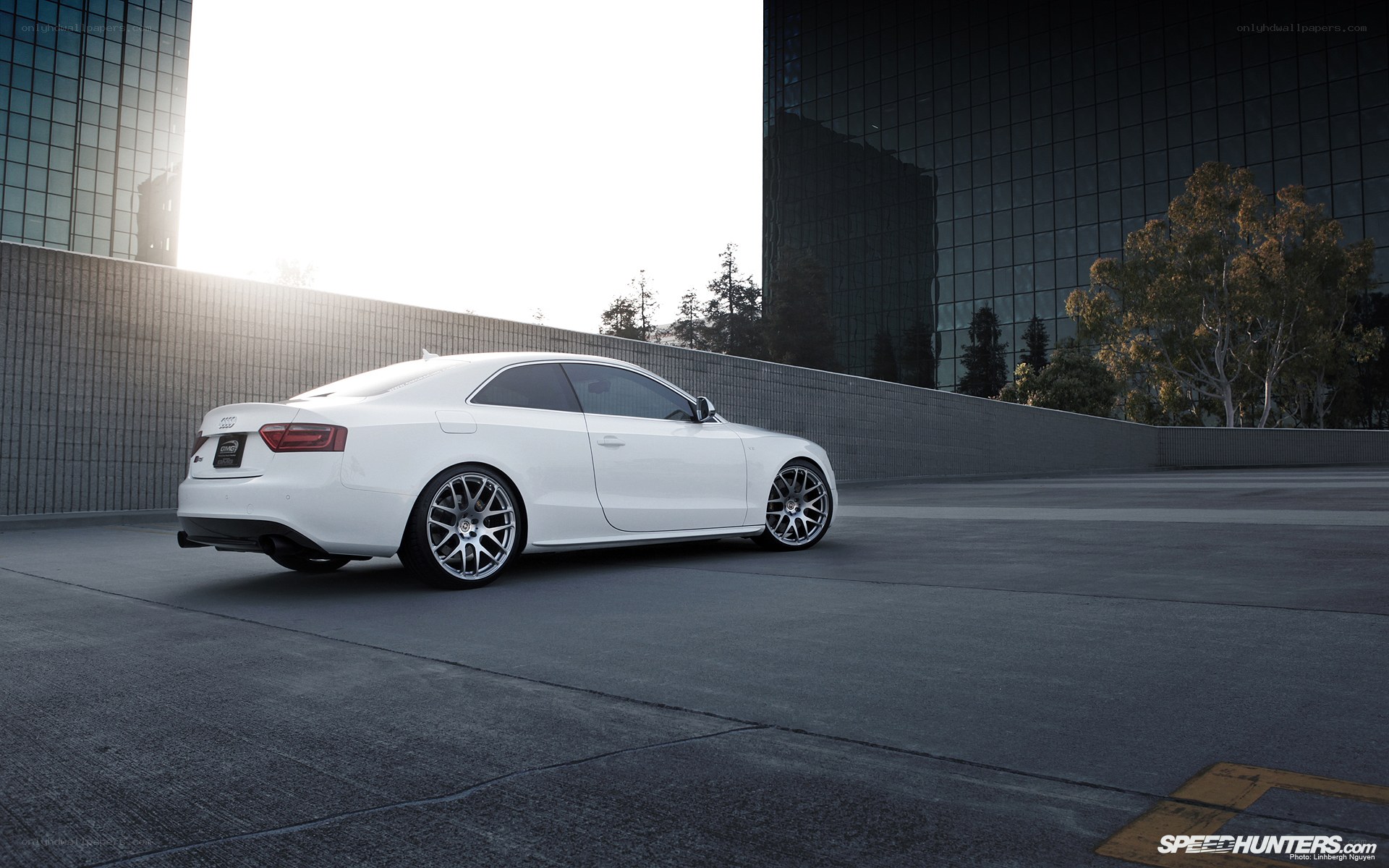 White Audi parked in city