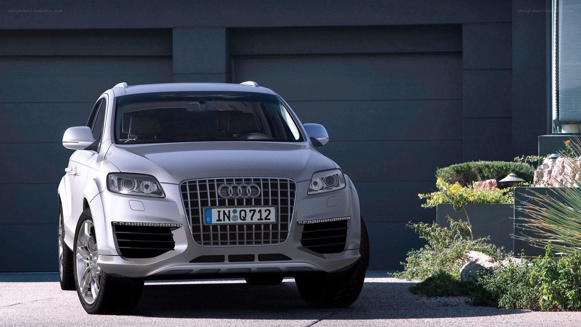 White Audi Q7 parked outside
