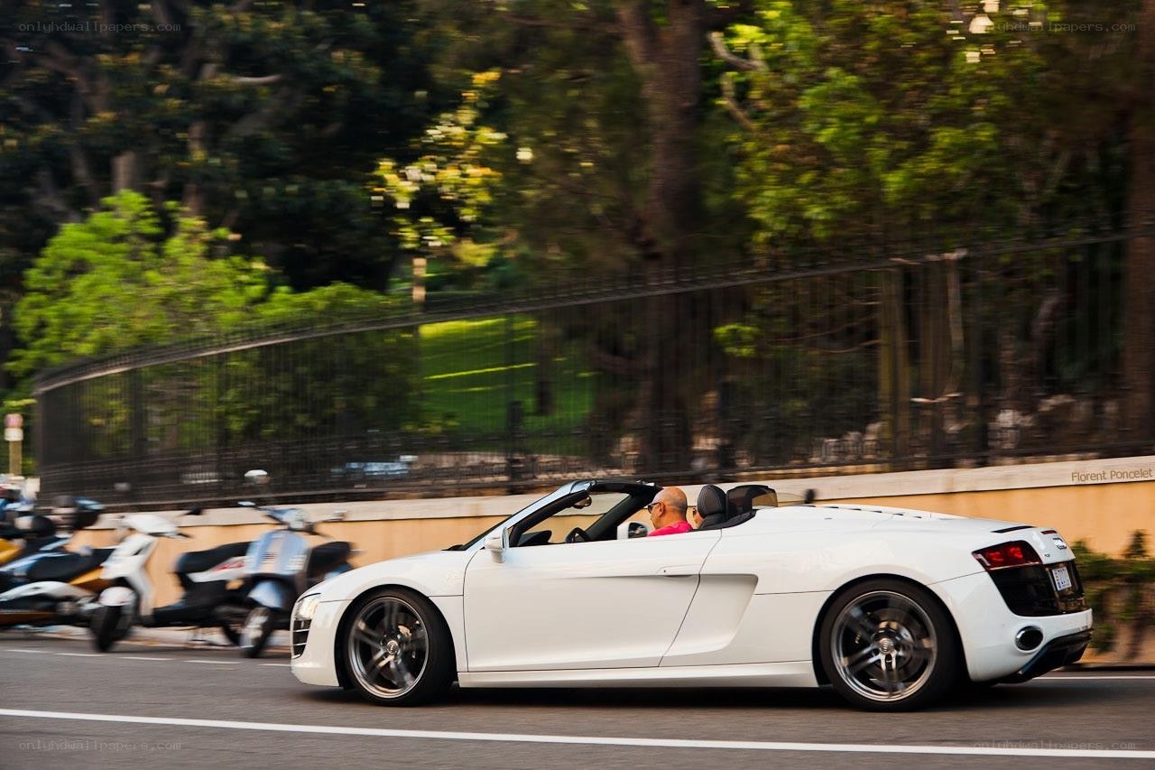 White Audi R8 convertible in motion
