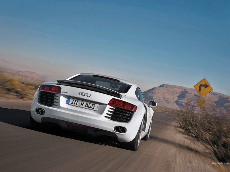white audi r8 driving on road