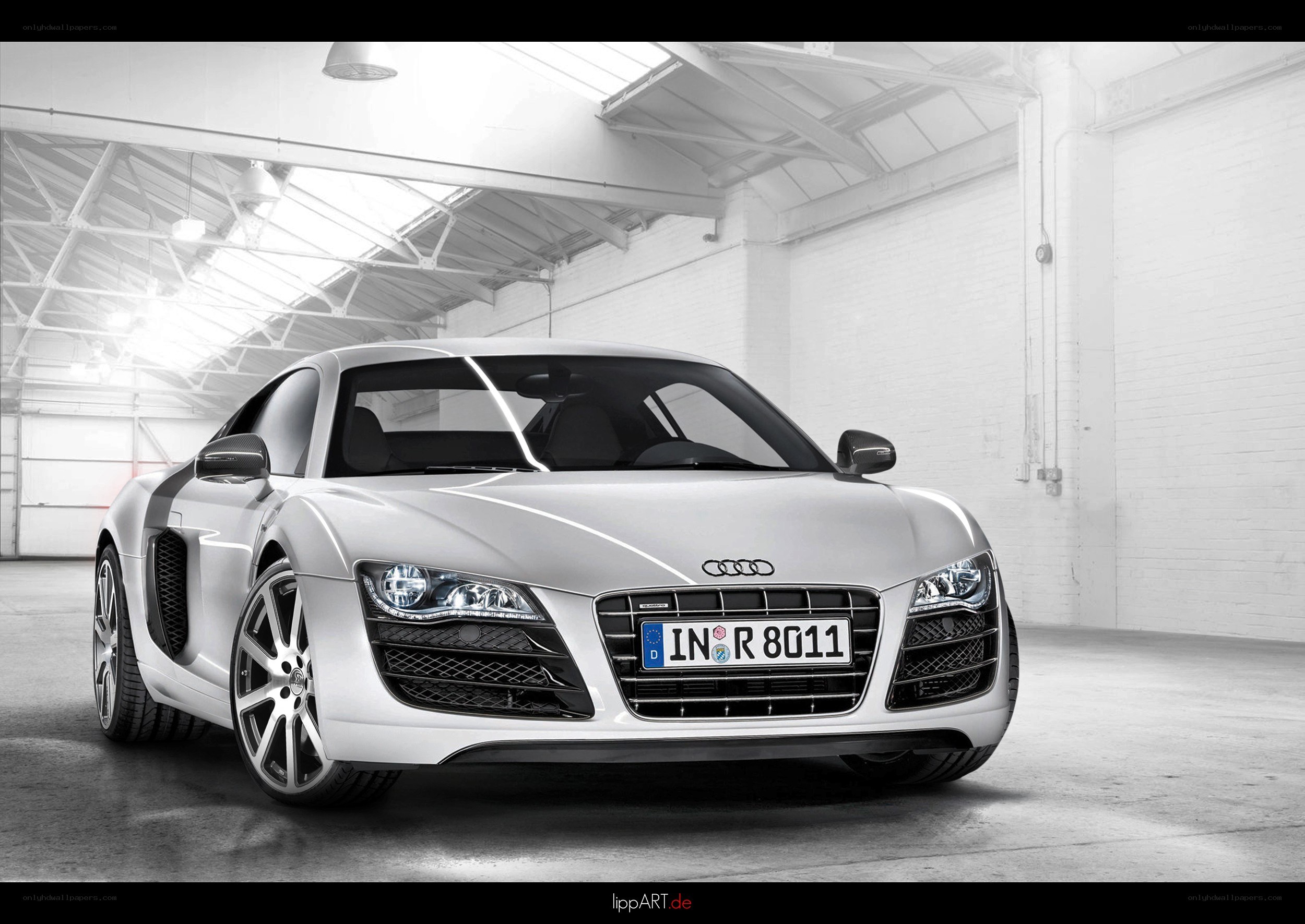 White Audi R8 in a warehouse