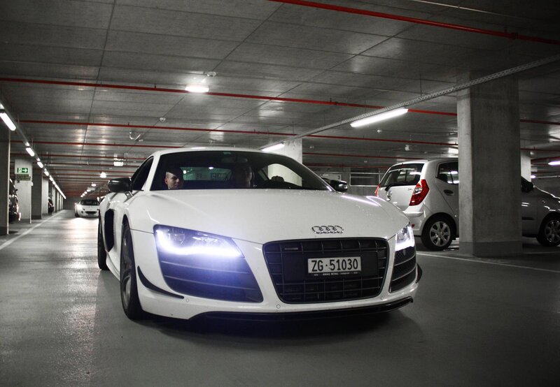 White Audi R8 in parking garage