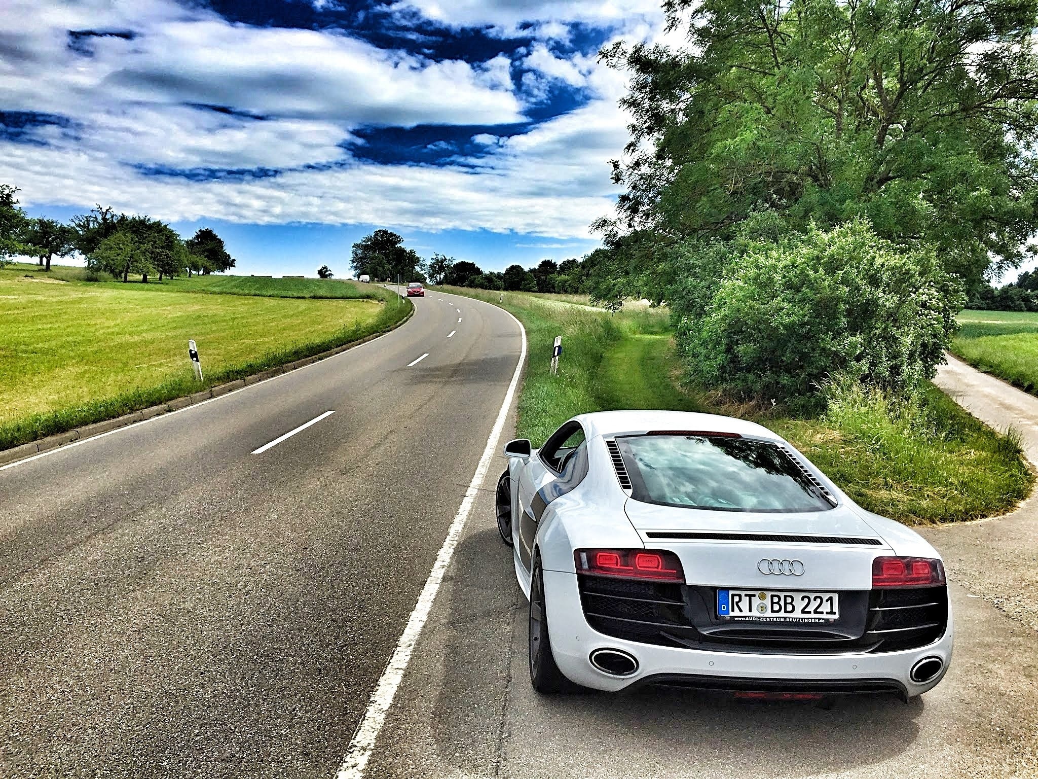 White Audi R8 on a country road