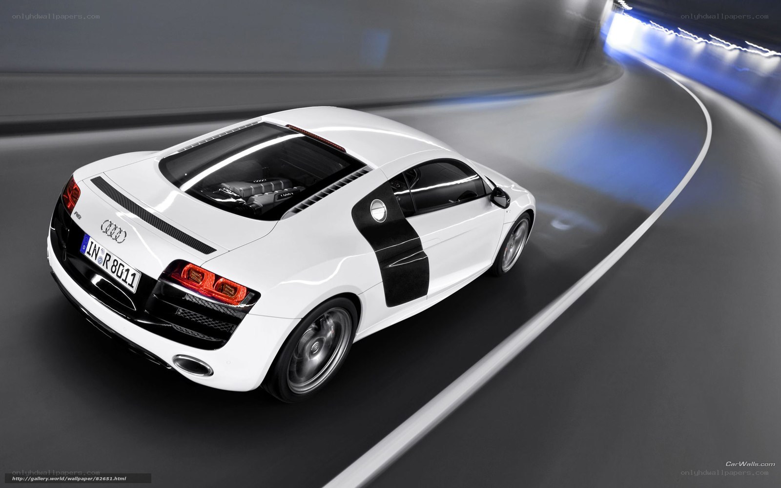 White Audi R8 on a curved road