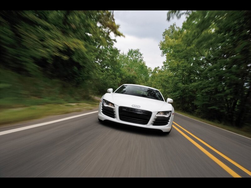 White Audi R8 on a forest road