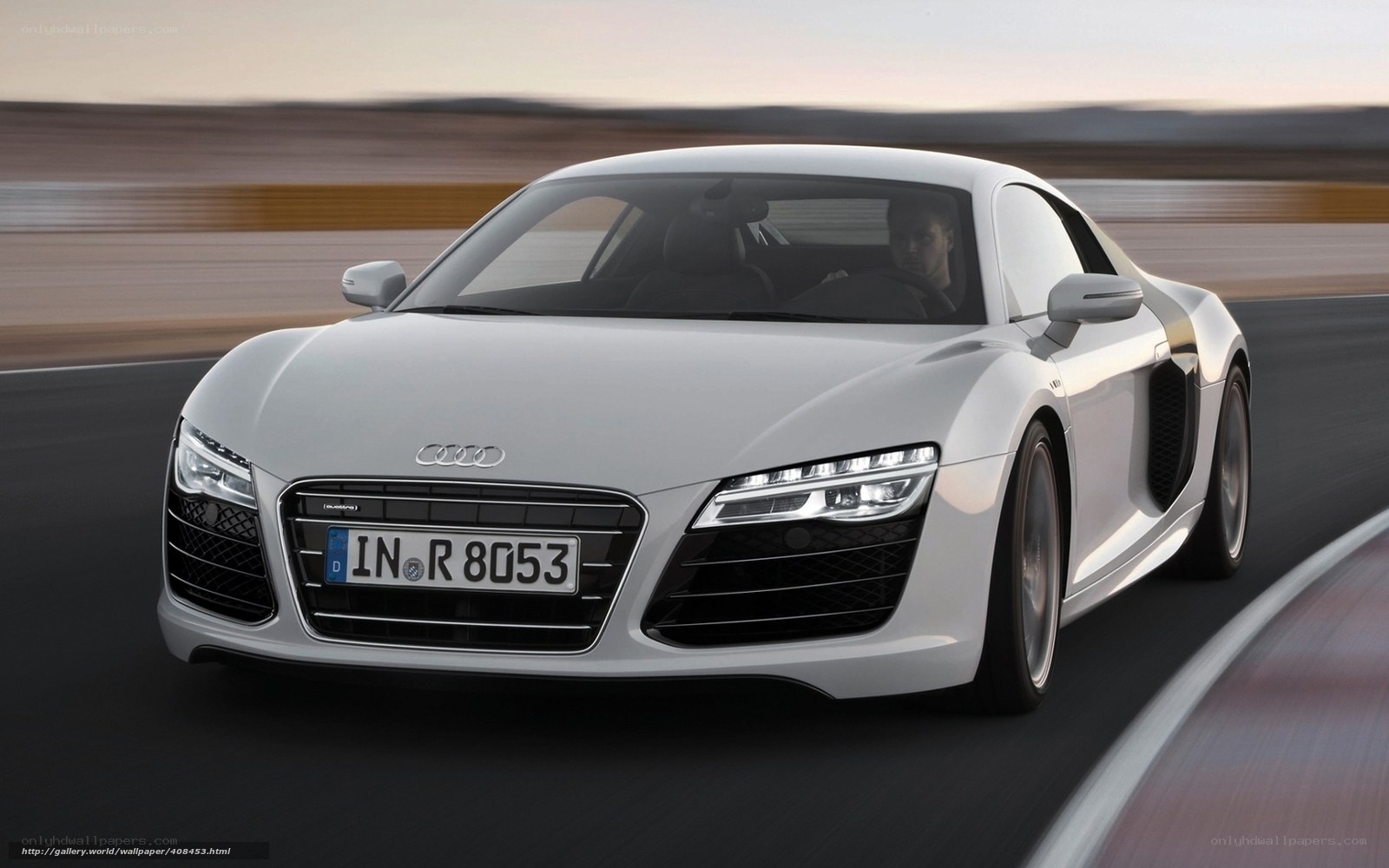 White Audi R8 on a racetrack