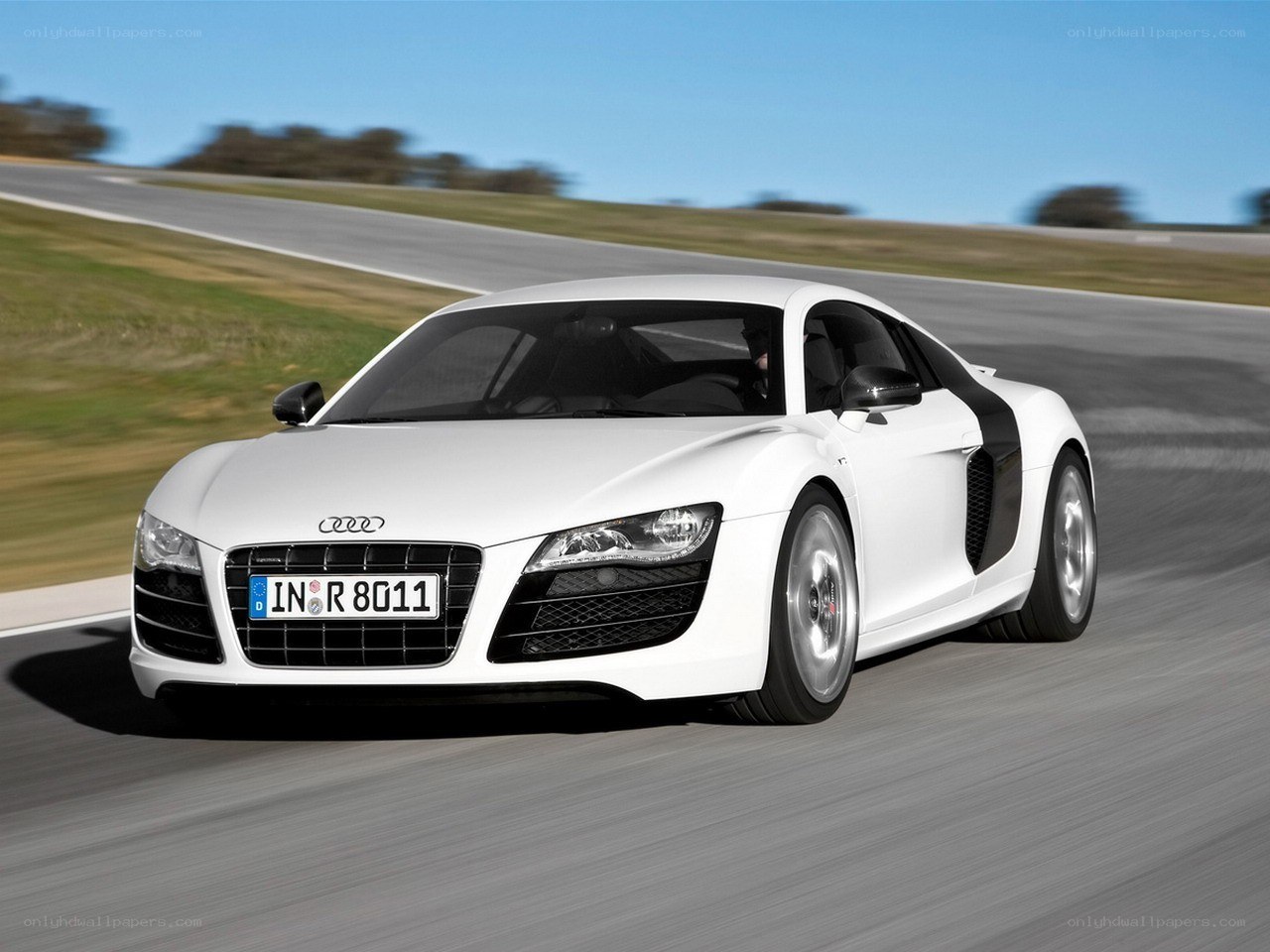 White Audi R8 on a racetrack