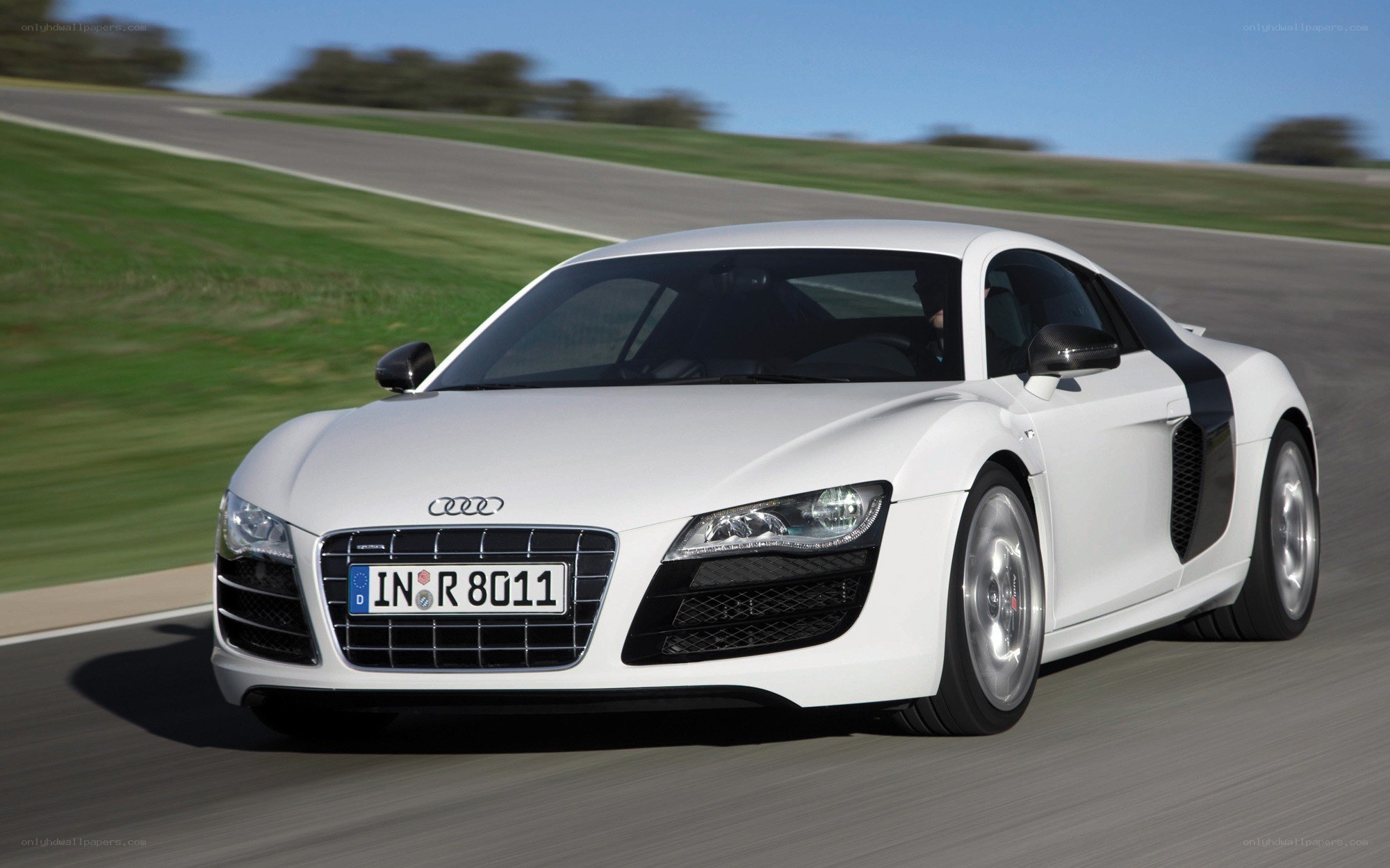 White Audi R8 on a racetrack