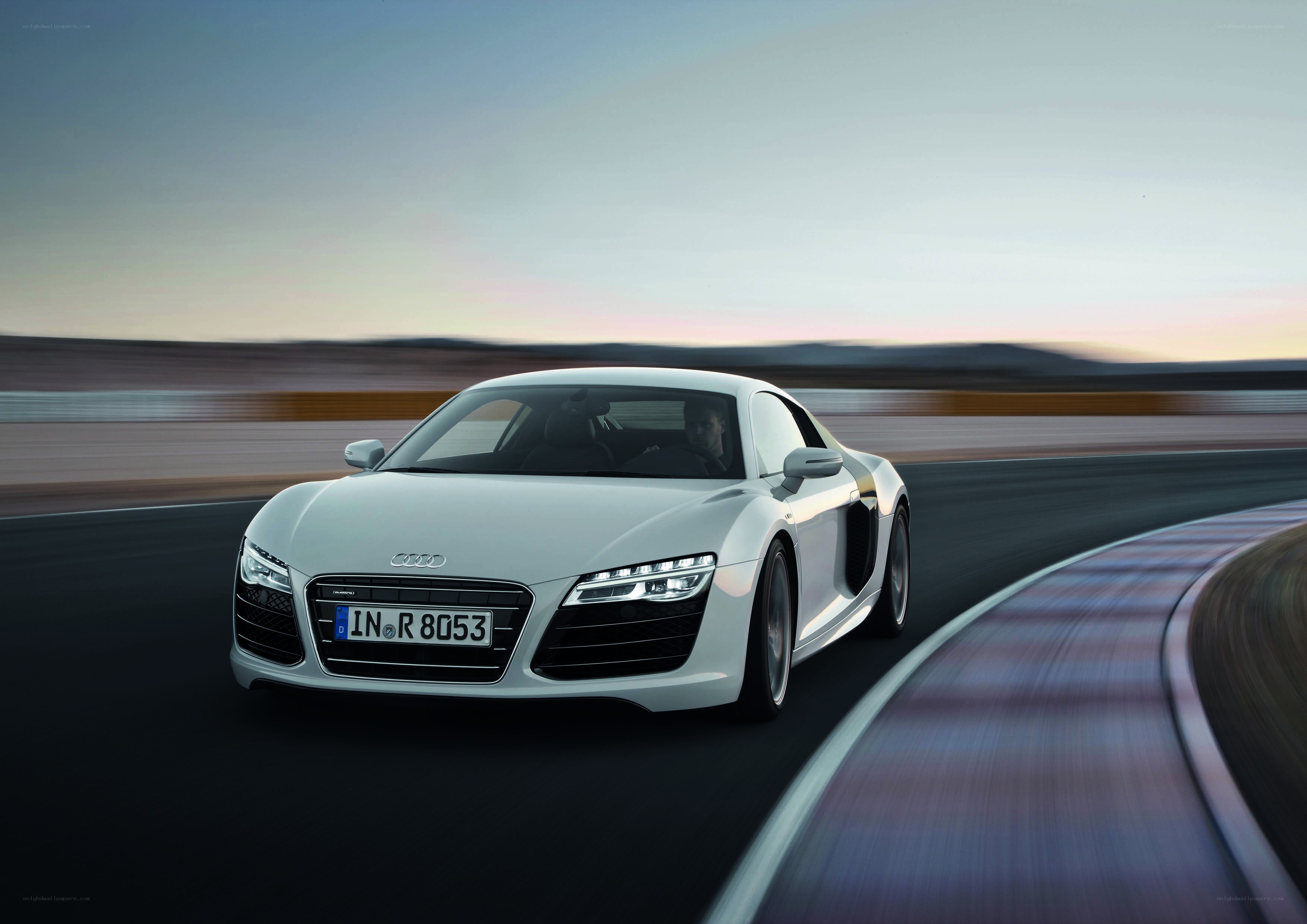 White Audi R8 on a racetrack