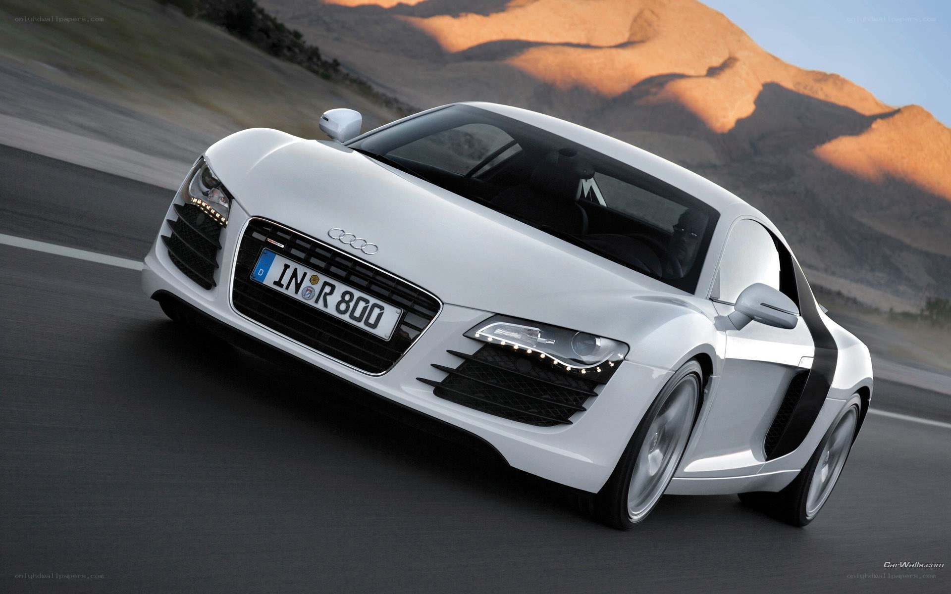 White Audi R8 on a road