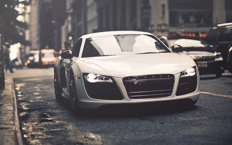White Audi R8 on city street