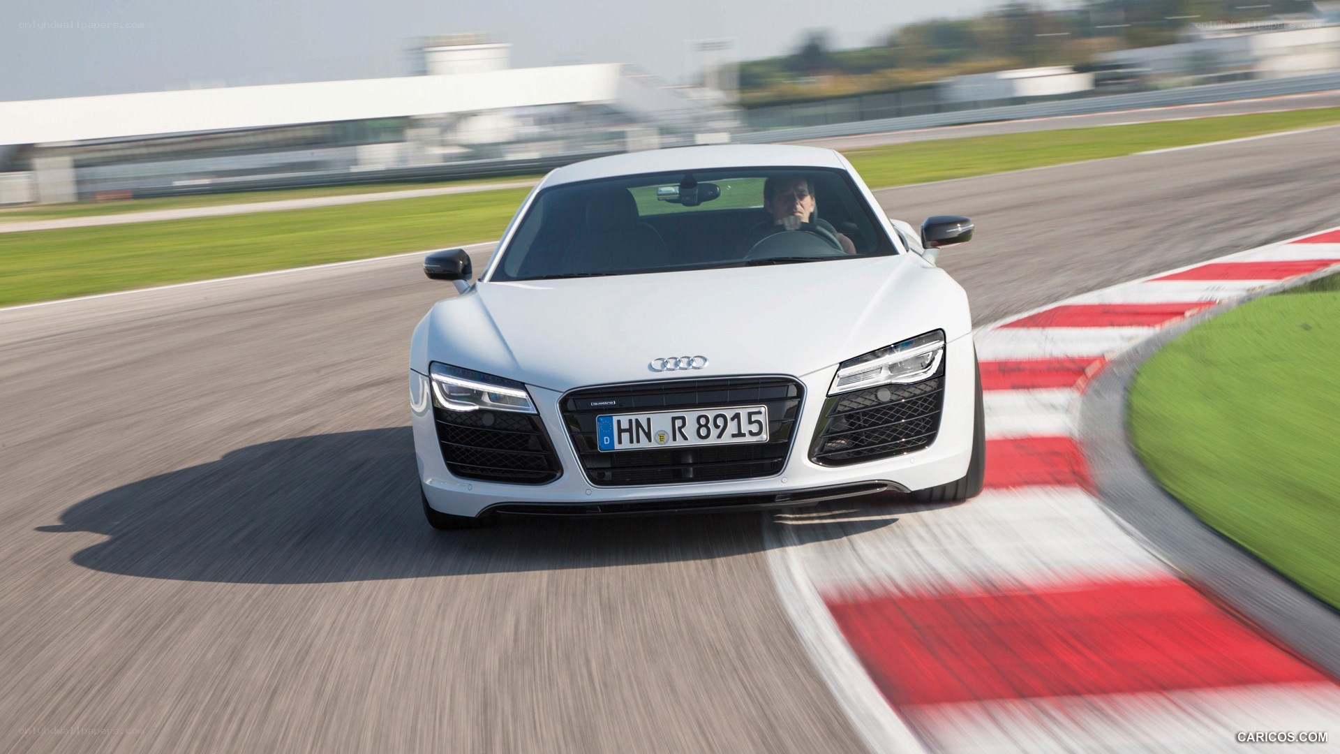 white audi r8 on racetrack