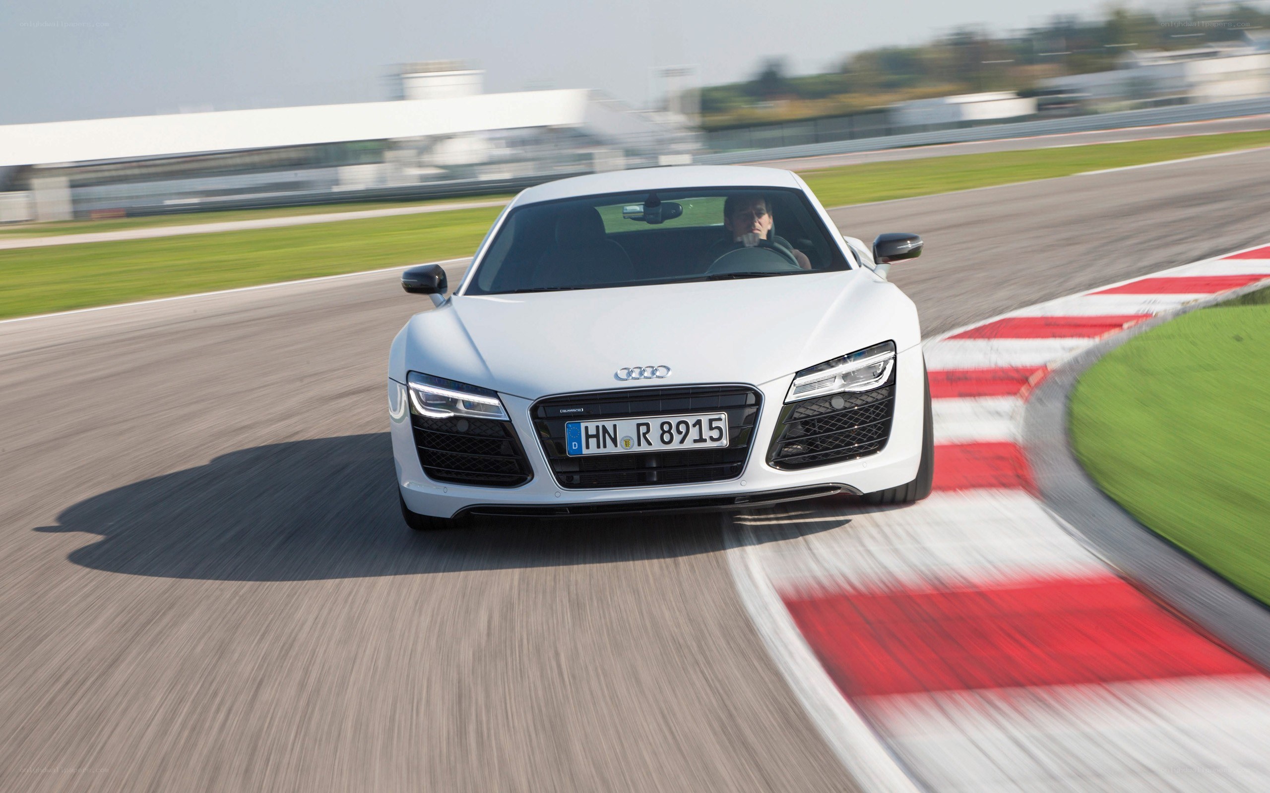 white audi r8 on racetrack
