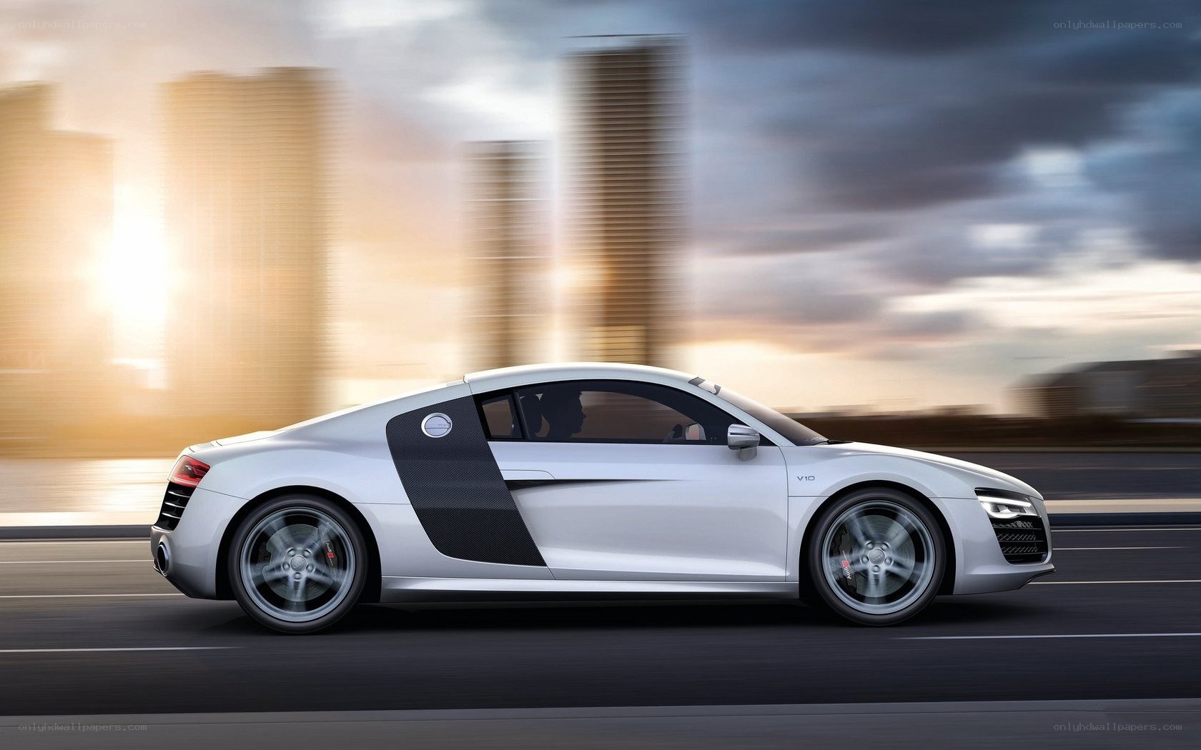 White Audi R8 speeding in city