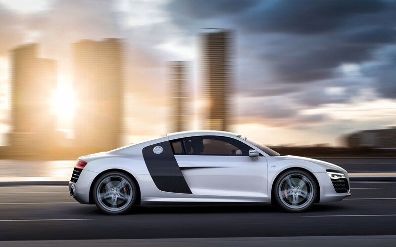 White Audi R8 speeding in city