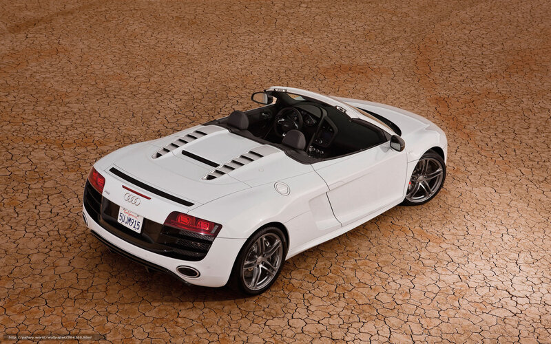 White Audi R8 Spyder on cracked earth