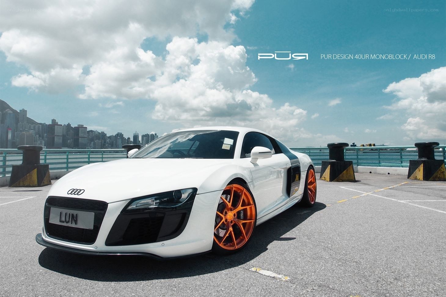 White Audi R8 with orange wheels