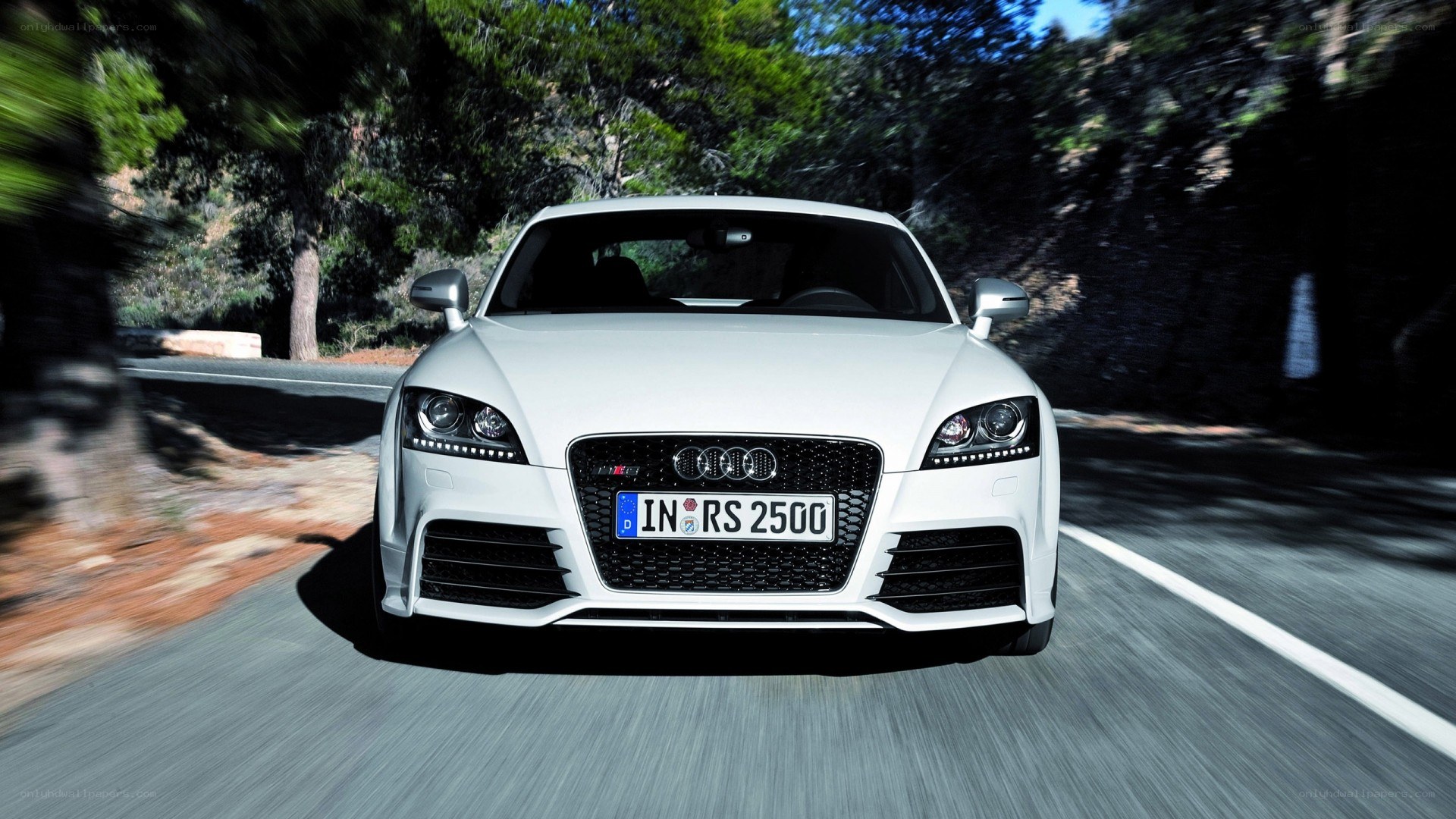 white audi rs2500 on road