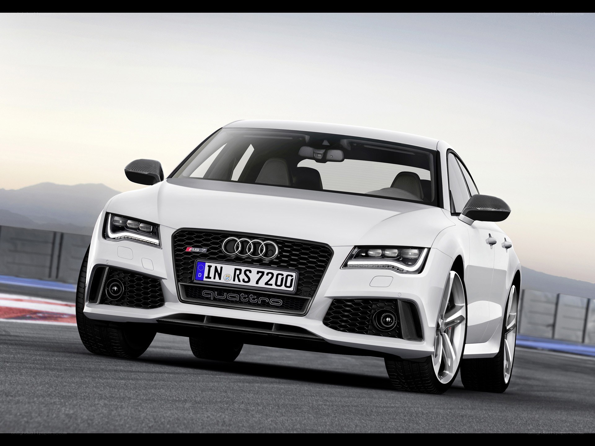 White Audi RS7 on a racetrack