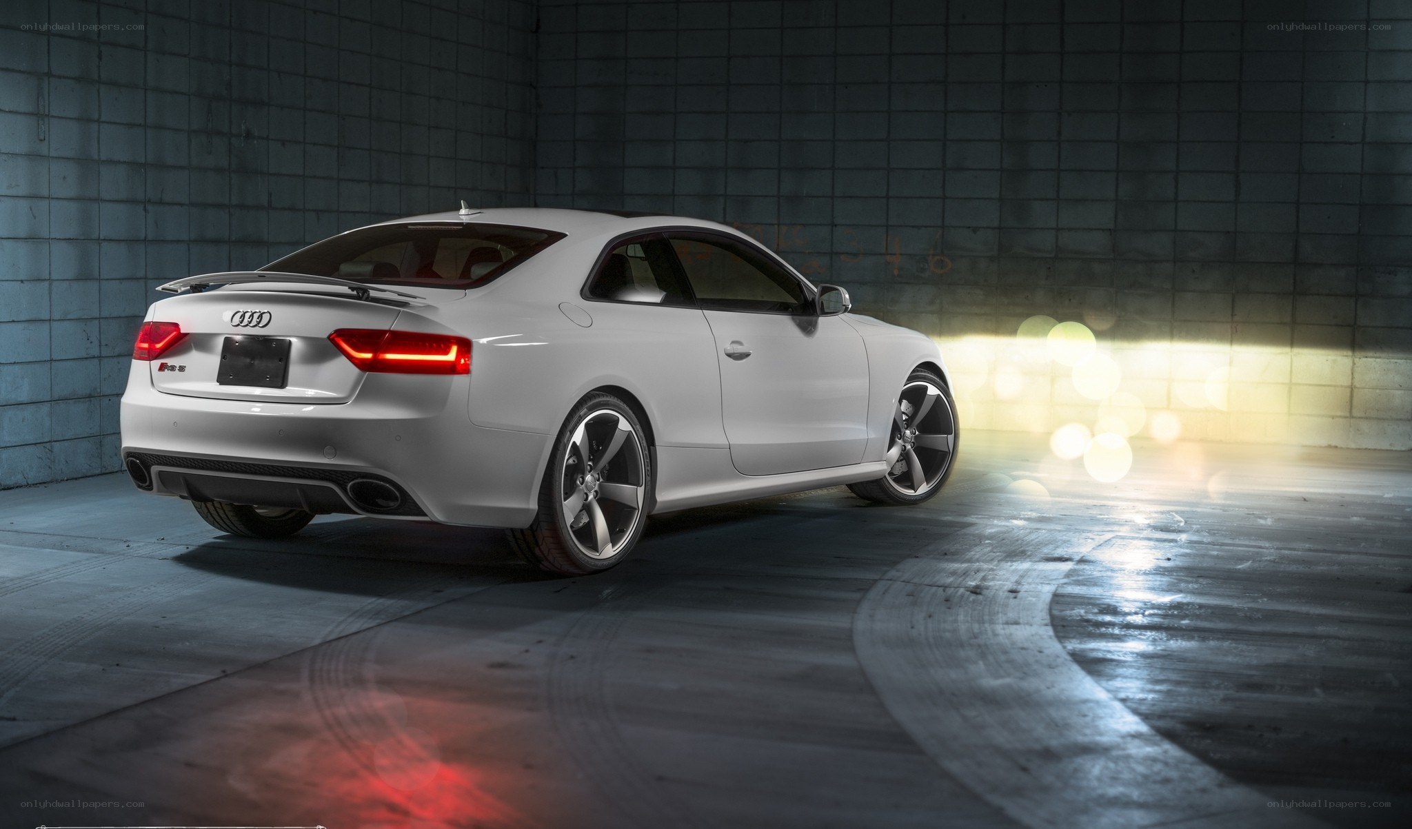 white audi s5 in garage