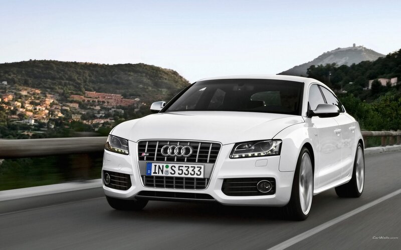 White Audi S5 on a scenic road