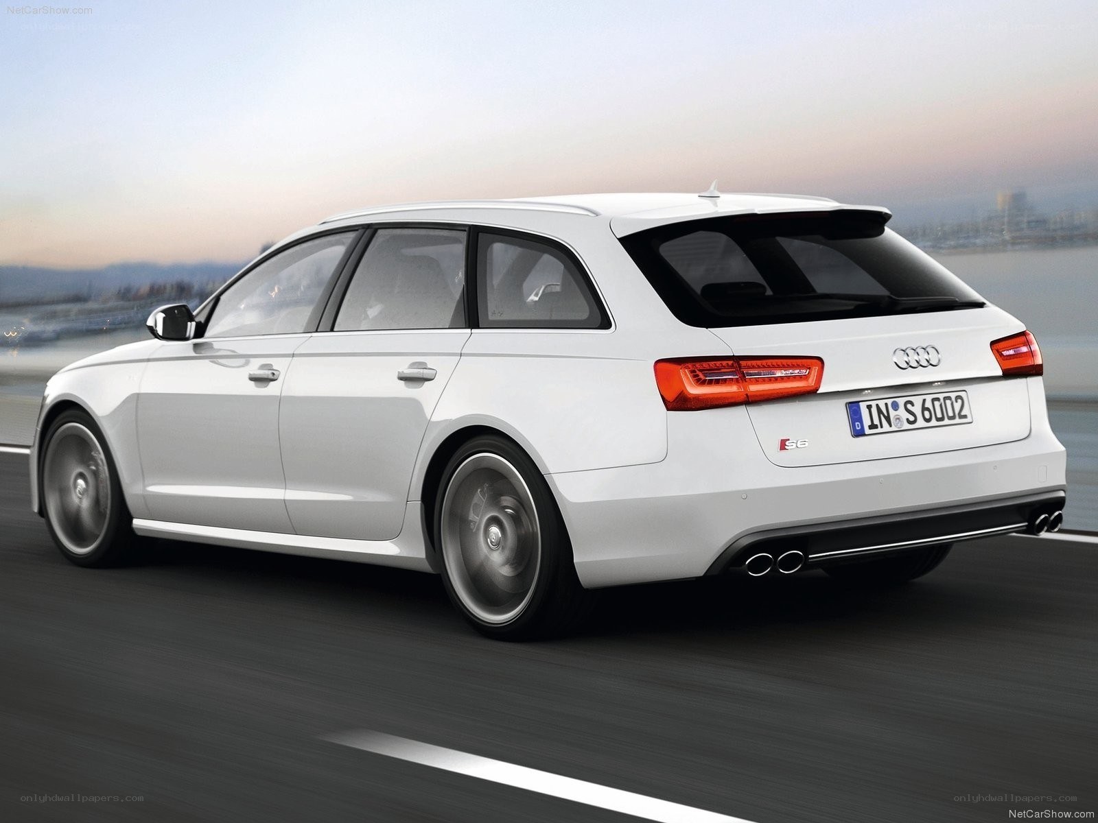 White Audi S6 Avant in motion