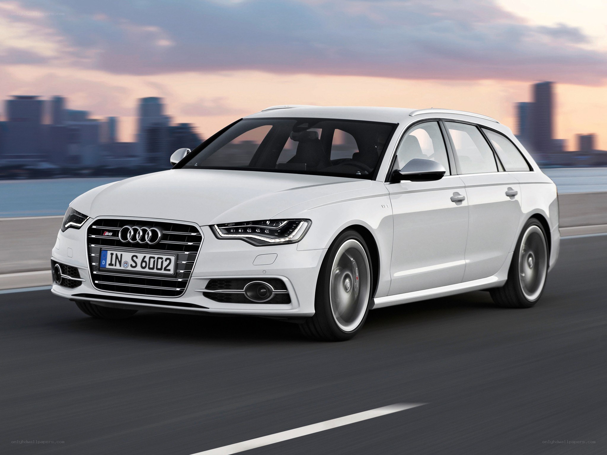 White Audi S6 Avant in motion