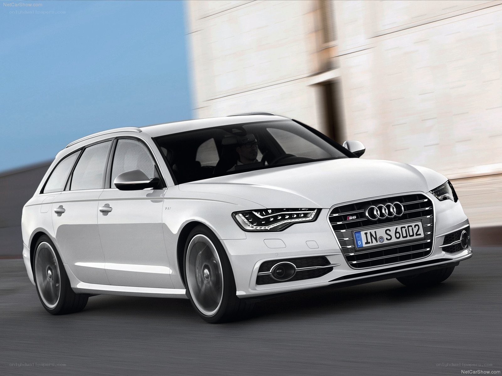 White Audi S6 Avant in motion