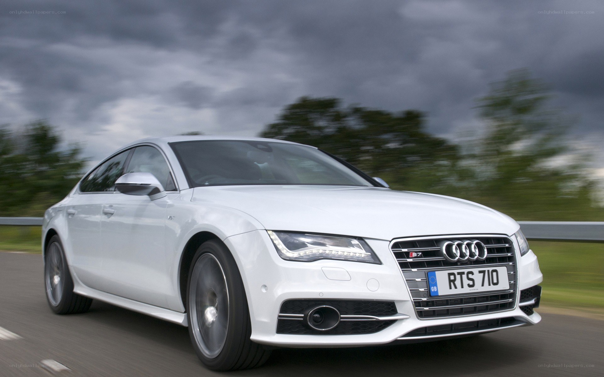 White Audi S7 in motion