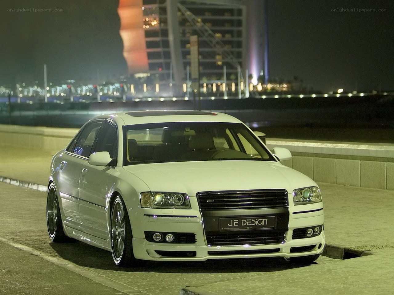 White Audi sedan at night