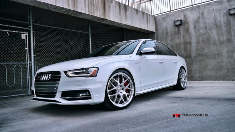White Audi Sedan — Dramatic, Photograph, Concrete Wall